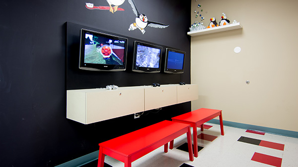 Game wall for pediatric dentist Dr. Bradley Harris in Conroe, TX